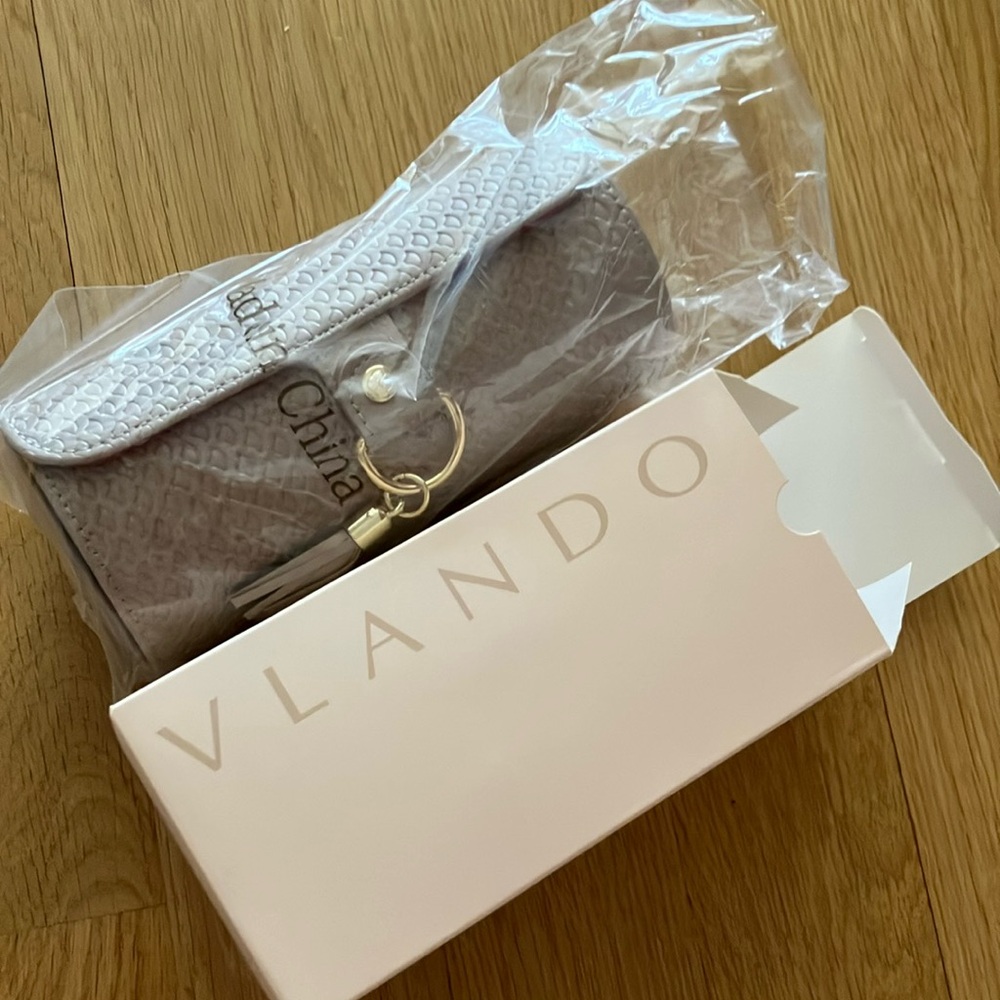 Brand new Taupe/grey Cosmetic Bag.